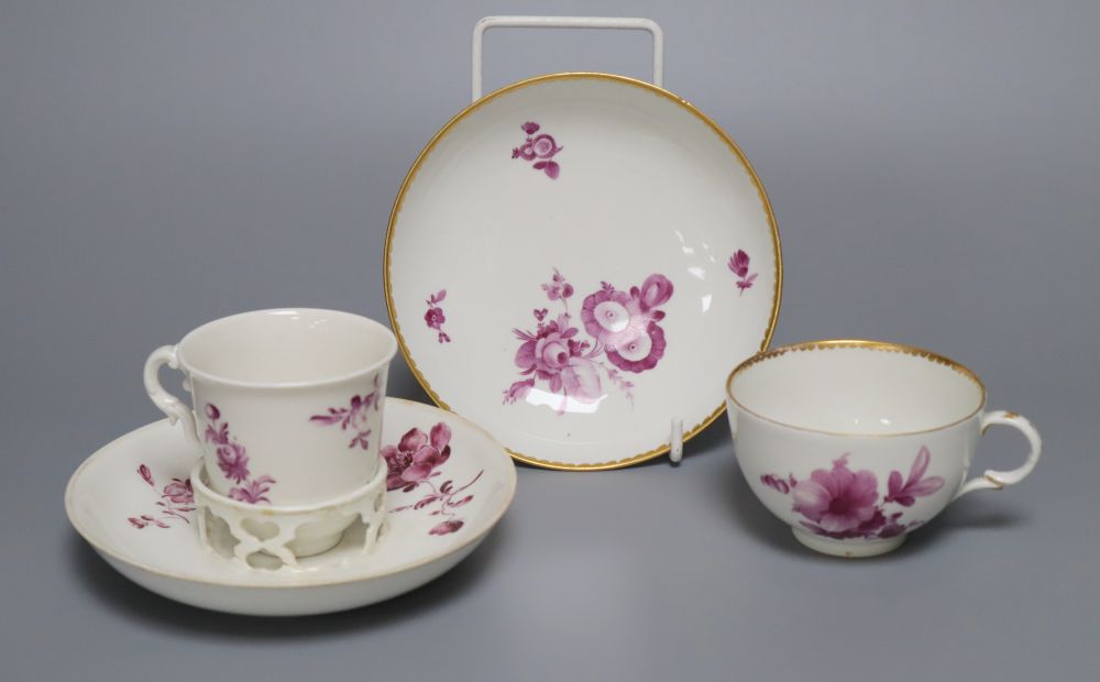 A Vienna puce en camaieu cup and trembleuse saucer, diameter 13.5cm (repair) and a similar Furstenburg cup and saucer, late 18th centur